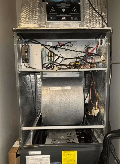 Internal Components of a Furnace Exposed During a Heating Repair Service in a Tucson Home